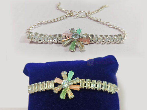 Close-up of silver plated crystal flower bracelet with multicolor gemstones and adjustable chain
