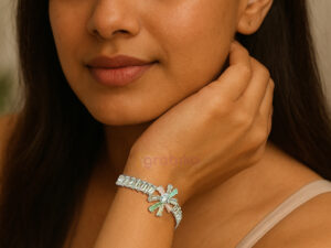 Close-up of silver plated crystal flower bracelet with multicolor gemstones and adjustable chain