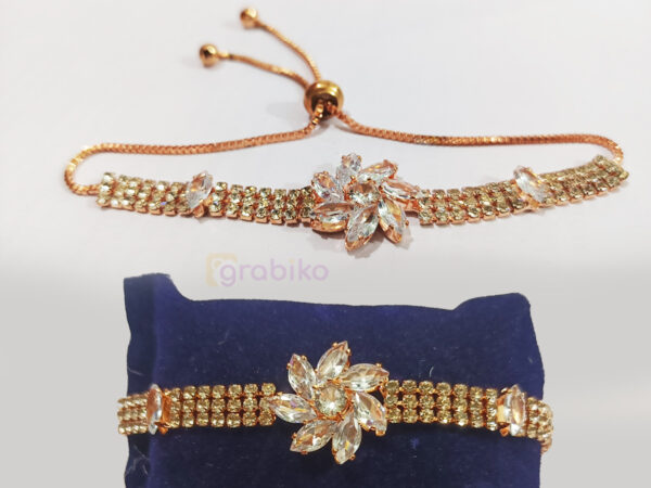 Elegant rose-gold bracelet with floral crystal centerpiece and adjustable chain