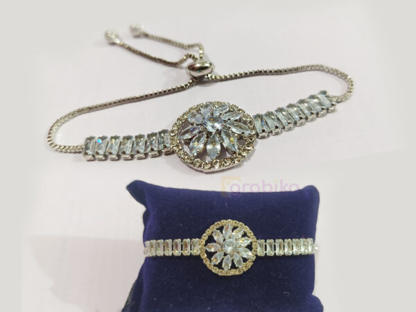 Close-up of luxury crystal flower bracelet with halo design and baguette stones on adjustable chain