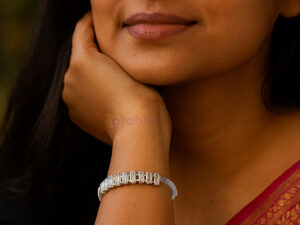 Elegant silver adjustable bracelet with baguette-cut zircon stones for women