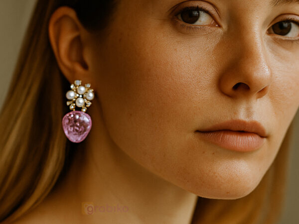 Trendy 3-pair earring combo for women with bow studs, pearl hoops, and crystal pink drop earrings.