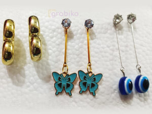 Trendy 3-pair earring combo for women with gold hoops, blue butterfly dangle earrings, and evil eye drops.