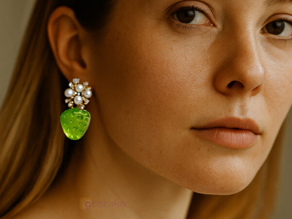 Elegant 3-pair earring combo with gold hoops, blue bow charm dangles, and pearl floral green drop earrings.