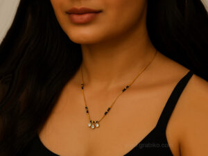 Dual-layer gold-plated necklace with black stone pendant and American diamond crystals