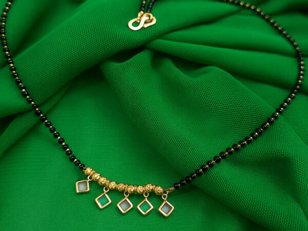 Elegant gold plated mangalsutra with black beads and square gemstone pendants