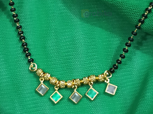 Elegant gold plated mangalsutra with black beads and square gemstone pendants