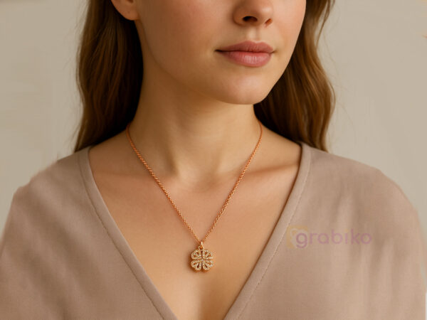 Rose gold magnetic necklace with convertible heart and clover pendant.